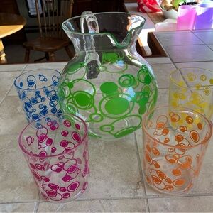 Plastic pitcher and cups
